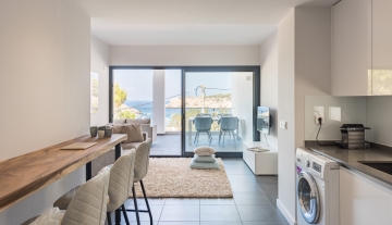 Resa Estates Ibiza te koop appartement Vadella Mar zee zicht living 2.jpg